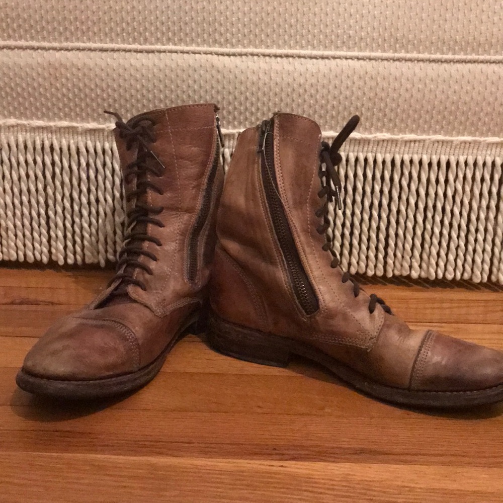 Ankle height brown leather moto boots with zip